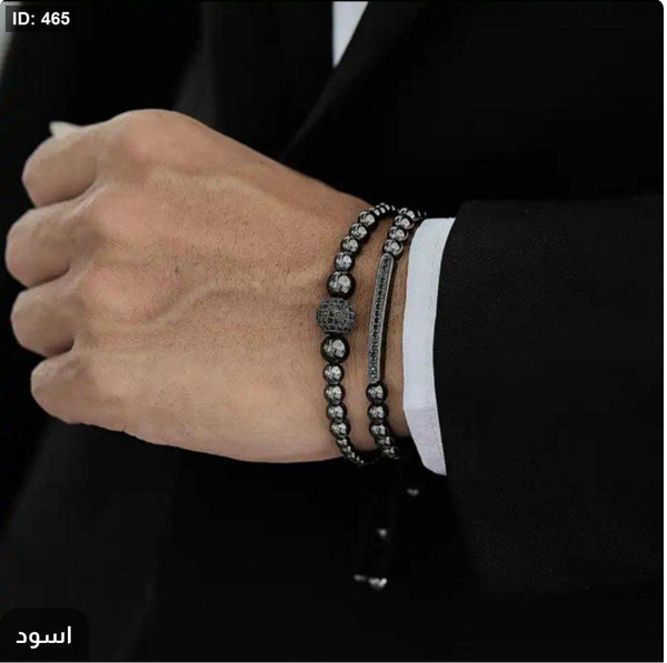 A set of youth blue bracelets - including a box