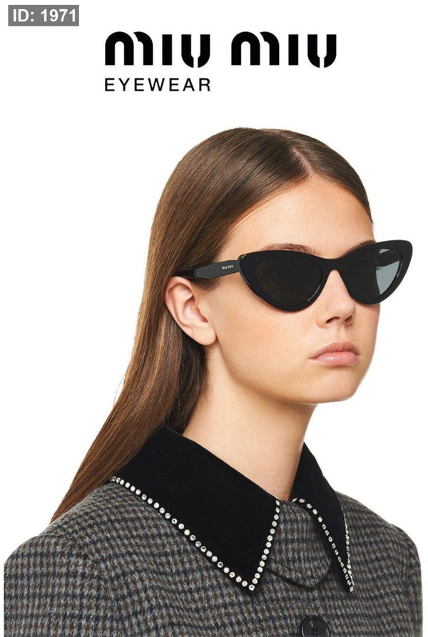 Cat eye style MIU MIU glasses / including a luxurious plain box and bag